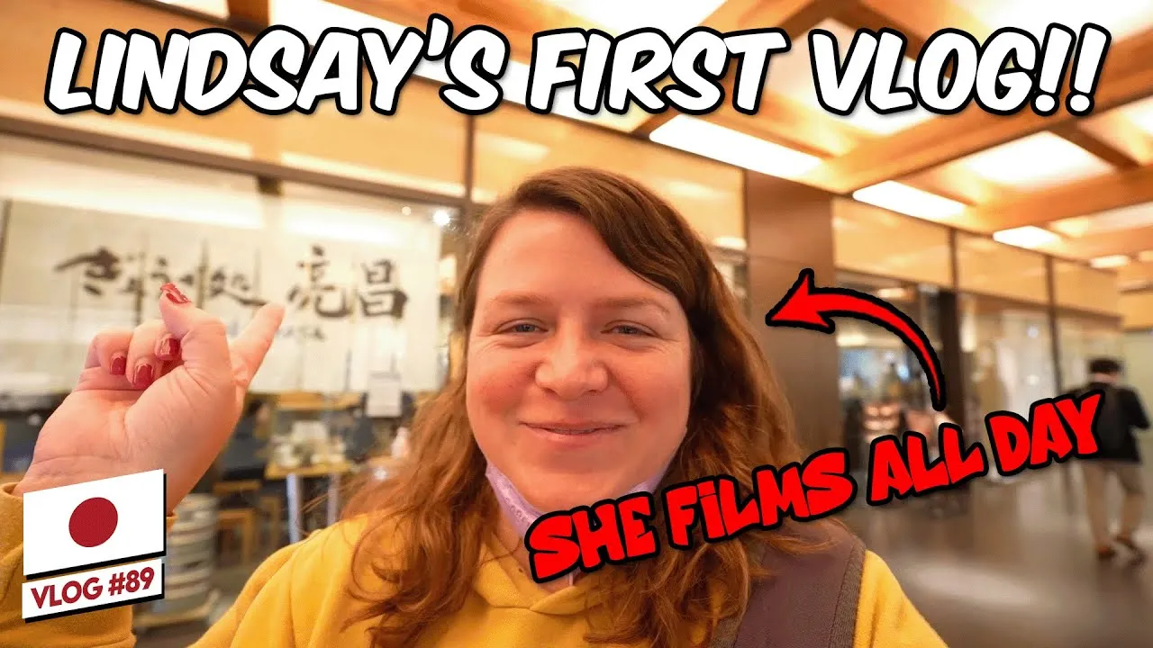 YouTube thumbnail for the Clarkson family's first time in Kyoto vlog, featuring a scene from their purikura photo booth visit.