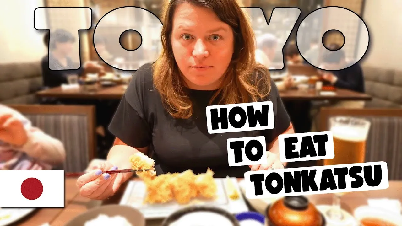 A YouTube thumbnail showing Lindsay holding a piece of tonkatsu with chopsticks at a Tokyo restaurant, a beer and side dishes visible on the table.